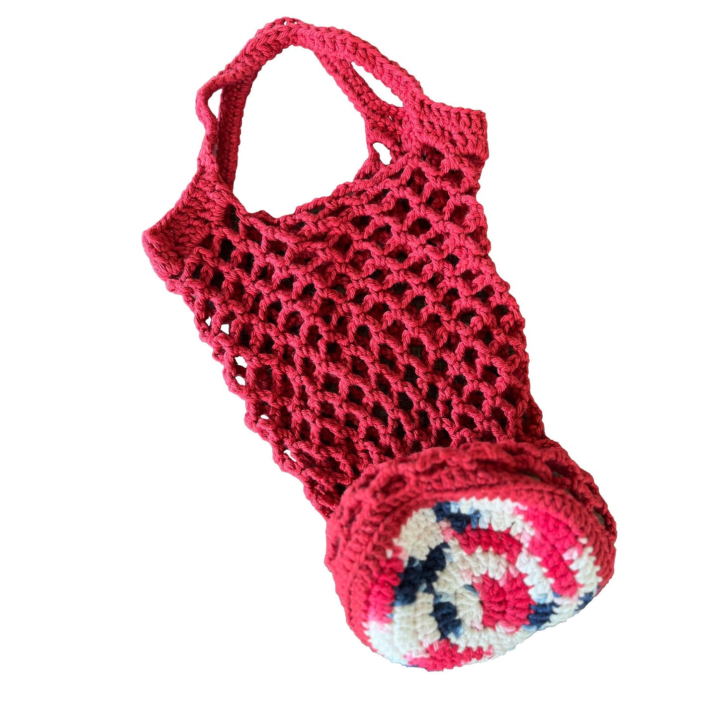 Red, white, and blue crochet bag on a white background
