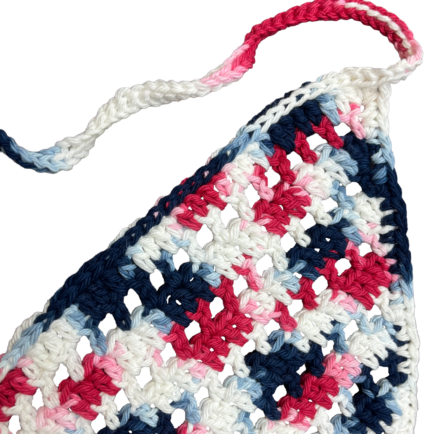 Colorful crocheted bandana with red, blue, and white pattern on a white background