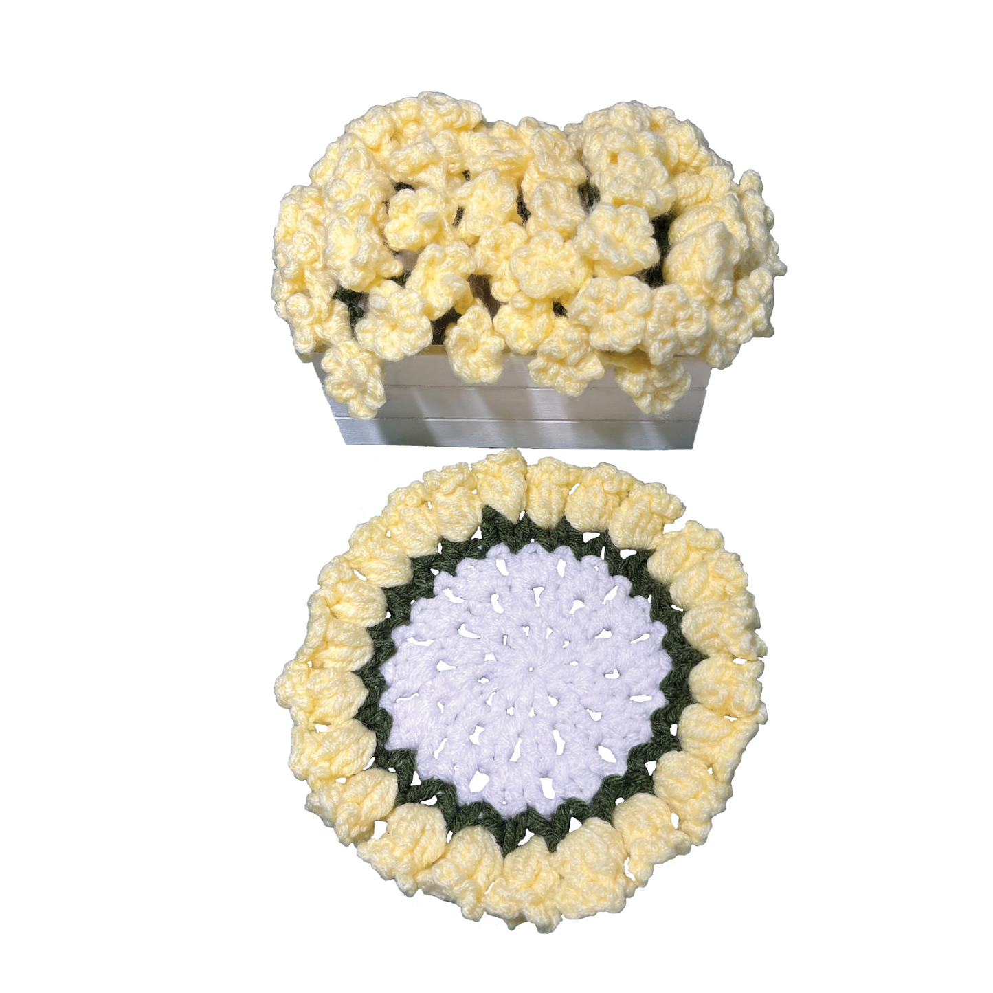 Two floral crochet coaster arrangements made of yellow flowers in wooden container on a white background