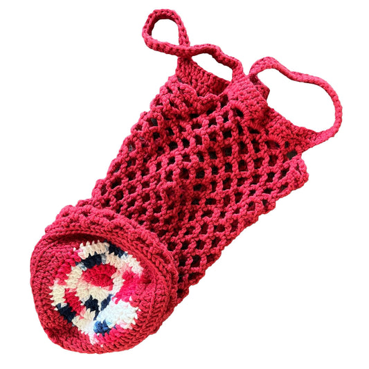 Red, white, and blue crocheted bag on a white background